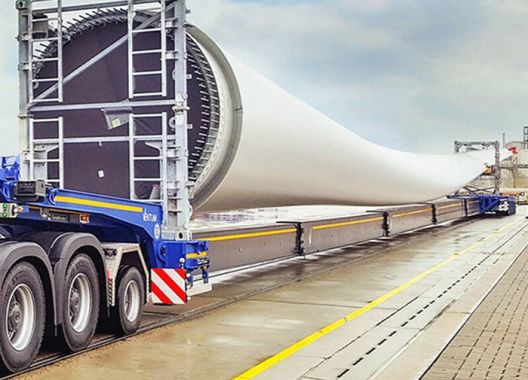 Mountain wind turbine blade transport vehicle